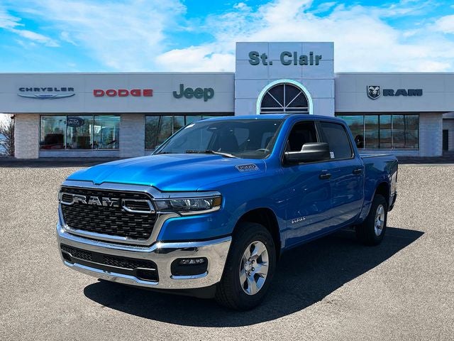 2026 RAM Ram 1500 RAM 1500 BIG HORN CREW CAB 4X4 5'7' BOX in Hydro Blue Pearl-Coat Exterior Paint — front three-quarter view