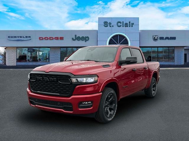 2026 RAM Ram 1500 RAM 1500 BIG HORN CREW CAB 4X4 5'7' BOX in Molten Red Pearl-Coat Exterior Paint — front three-quarter view