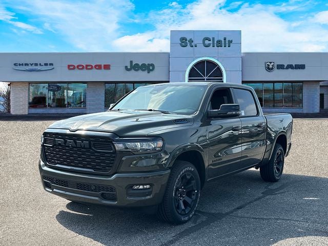 2026 RAM Ram 1500 RAM 1500 BIG HORN CREW CAB 4X4 5'7' BOX in Tank Exterior Paint — front three-quarter view