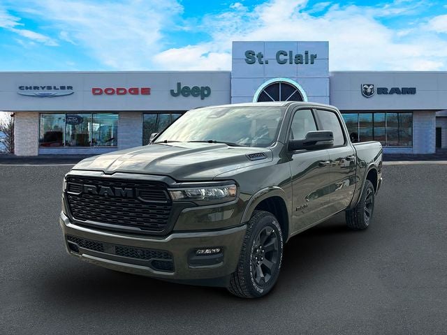 2026 RAM Ram 1500 RAM 1500 BIG HORN CREW CAB 4X4 5'7' BOX in Tank Exterior Paint — front three-quarter view