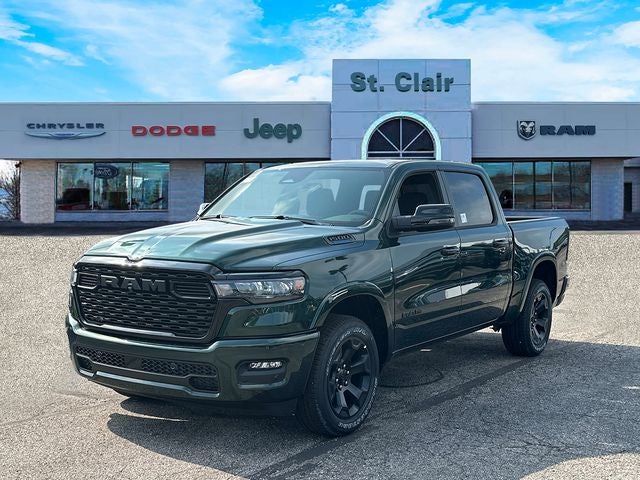 2026 RAM Ram 1500 RAM 1500 BIG HORN CREW CAB 4X4 5'7' BOX in Serrano-Green Metallic Exterior Paint — front three-quarter view
