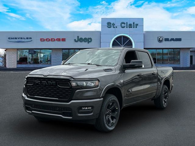 2026 RAM Ram 1500 RAM 1500 BIG HORN CREW CAB 4X4 5'7' BOX in Granite Crystal Metallic Clear-Coat Exterior Paint — front three-quarter view