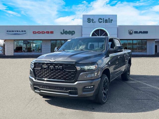 2026 RAM Ram 1500 RAM 1500 BIG HORN CREW CAB 4X4 5'7' BOX in Granite Crystal Metallic Clear-Coat Exterior Paint — front three-quarter view