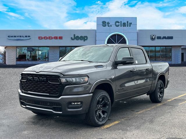 2026 RAM Ram 1500 RAM 1500 BIG HORN CREW CAB 4X4 5'7' BOX in Granite Crystal Metallic Clear-Coat Exterior Paint — front three-quarter view