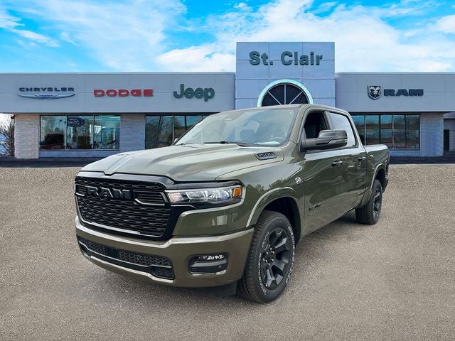 2026 RAM Ram 1500 RAM 1500 BIG HORN CREW CAB 4X4 5'7' BOX in Tank Exterior Paint — front three-quarter view
