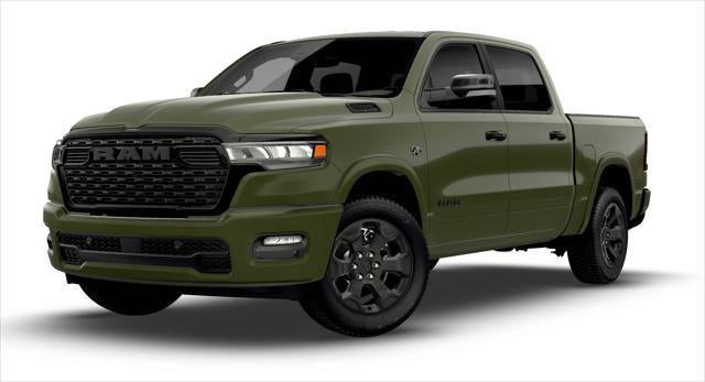 2026 RAM Ram 1500 RAM 1500 BIG HORN CREW CAB 4X4 5'7' BOX in Tank Exterior Paint — front three-quarter view