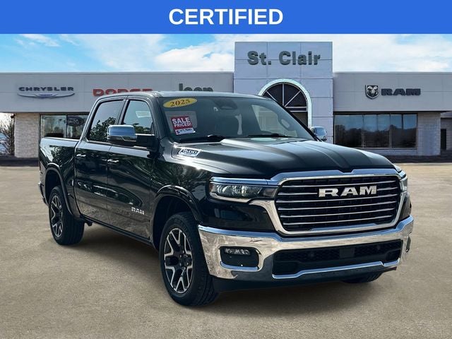 2025 RAM 1500 Laramie Crew Cab 4x4 5'7' Box in Diamond Black Crystal Pearlcoat — front three-quarter view