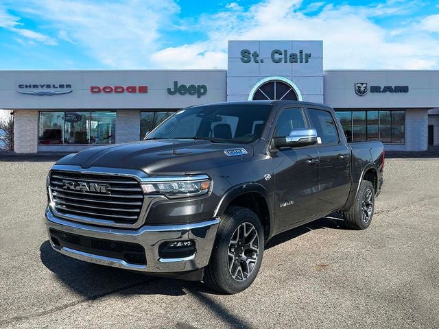 2026 RAM Ram 1500 RAM 1500 LARAMIE CREW CAB 4X4 5'7' BOX in Granite Crystal Metallic Clear-Coat Exterior Paint — front three-quarter view