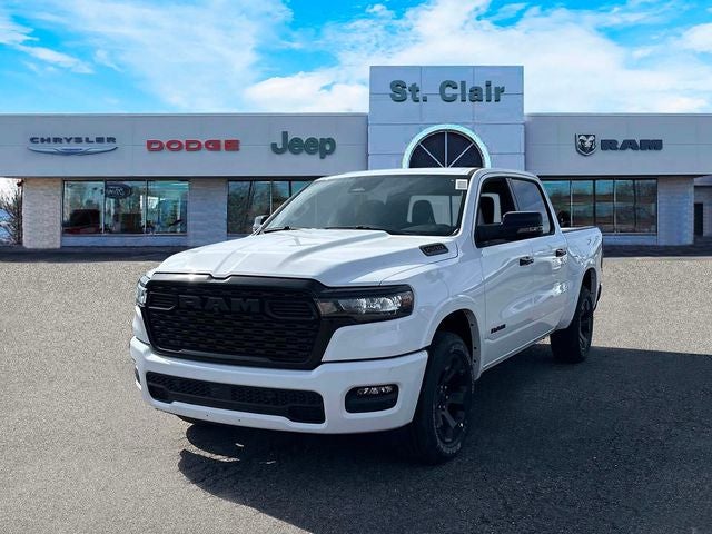 2026 RAM Ram 1500 RAM 1500 BIG HORN CREW CAB 4X4 5'7' BOX in Bright White Clear-Coat Exterior Paint — front three-quarter view