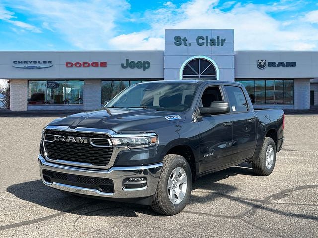 2026 RAM Ram 1500 RAM 1500 BIG HORN CREW CAB 4X4 5'7' BOX in Forged Blue Metallic Exterior Paint — front three-quarter view