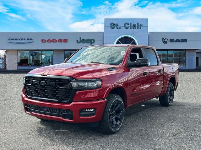 2026 RAM Ram 1500 RAM 1500 BIG HORN CREW CAB 4X4 5'7' BOX in Molten Red Pearl-Coat Exterior Paint — front three-quarter view